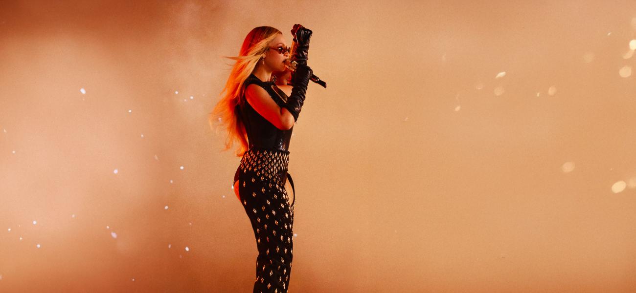 Beyoncé wears a custom Tongoro Couture Cowboy Chaps adorned with 444 golden cowries and 44 crystals for the opening night of the Cowboy Carter tour in Houston, Texas.