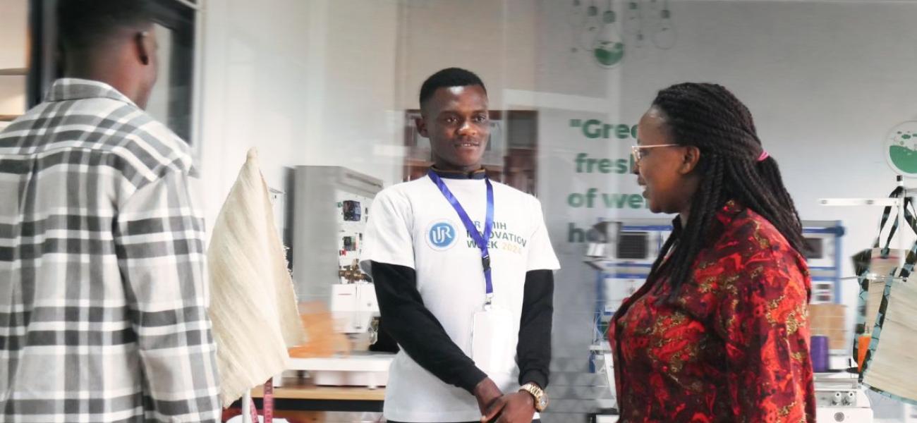 Shauri Kalibatha Jonathan, (Centre) a mechanical engineer and co-founder of Re-banatex, a company that converts banana trunks into eco-friendly textile products. (Supplied)