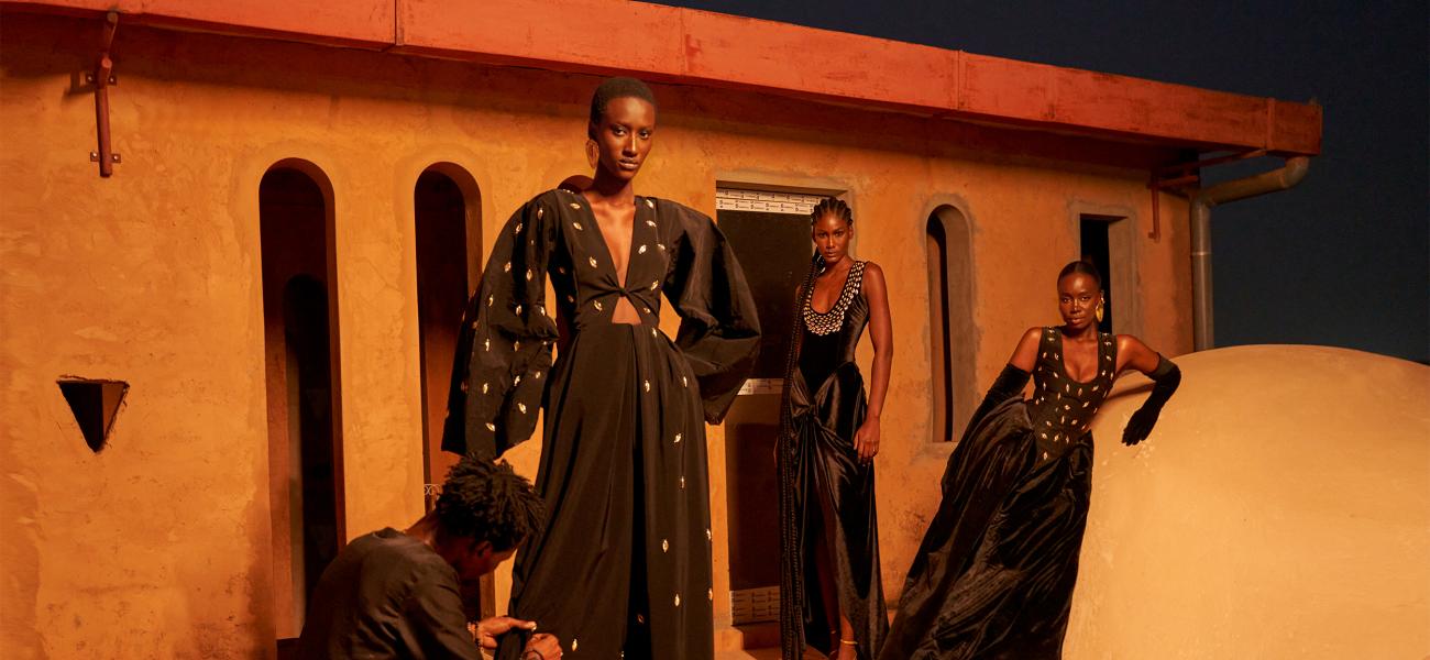 Designer Sarah Diouf, with some of her Tongoro Couture designs.