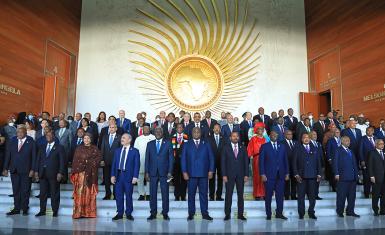 A large group of African leaders on stage at the AU Assembly of the Union in February 2022.