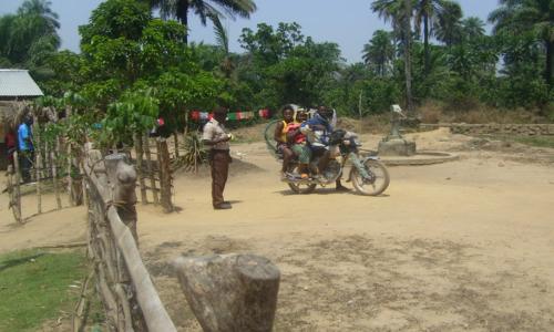 This motorbike has crossed the border from Sarkonedou in Liberia to Koutizou in Guinea. The opening of Liberia’s official borders enables economic activities and allows students to attend school. Photo: UNMEER/Kennei Momoh