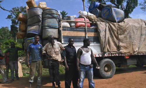 Truckers from Guinea wait to be screened for Ebola at the busy Konadu checkpoint in Lofa County, Liberia.