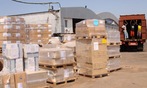 Ebola response: medical supplies, including protective equipment and essential medicine, are loaded onto trucks at the Lungi International Airport in Freetown, capital of Sierra Leone. Photo: UNICEF/Sulaiman Stephens