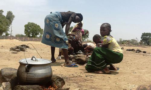 Girls in northern Nigeria prepare a meal. The crisis caused by the Boko Haram insurgency threatens to undermine development throughout the region. Photo: UNFPA Nigeria/Ololade Daniel