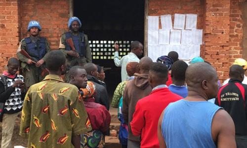 UN peacekeepers keep a watchful eye on proceedings at a polling centre as the Central African Republic (CAR) voted in presidential and legislative elections. Photo: MINUSCA
