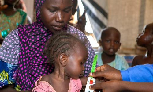 A nutrition screening for children in the Dalori camp for internally displaced people, in the north-eastern city of Maiduguri in Borno State. Photo: UNICEF/ Esiebo