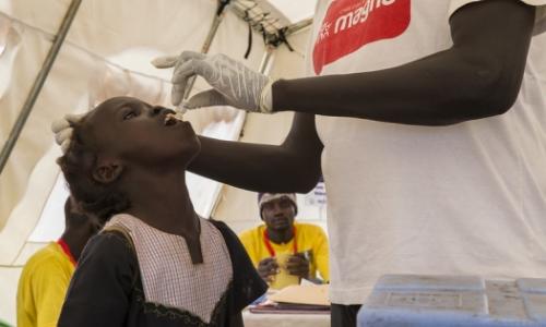 A young girl receiving oral cholera vaccination. Juba, South Sudan.