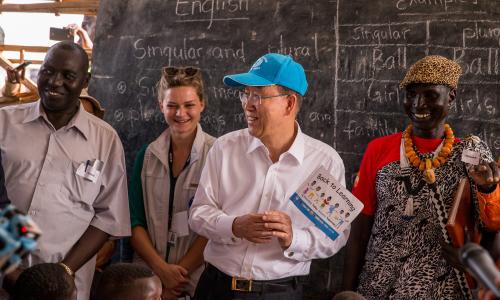 Secretary-General Ban Ki-moon (centre) visits Protection of Civilians Site 3 (PoC 3), adjacent to UN House, where he met with children from Hope Primary School. 25 February 2016 Juba, South Sudan. UN Photo/JC McIlwaine
