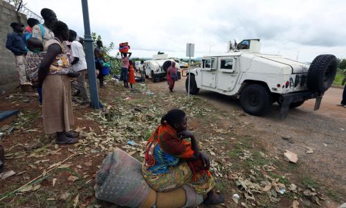 Displaced civilians leave the UNMISS (UN Mission in South Sudan) base in UN House, after seeking refuge at the base in the wake of recent fresh clashes in Juba between soldiers of the Sudan People's Liberation Army (SPLA) and the SPLA in Opposition (SPLA-