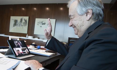Secretary-General António Guterres in a three-way video call with frontline mental health workers, Mr. Umair Bachlani in Pakistan and Ms. Charlene Sunkel in South Africa. UN Photo/Eskinder Debebe