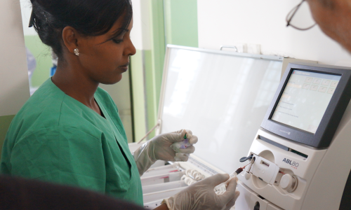 A nurse receives training on equipment donated by UNDP Eritrea