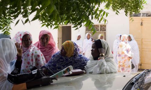 Women discuss politics at a women’s conference in Darfur, Sudan.