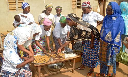 Women in the Lougba group, Benin, making soy biscuits. Photo: ANAF Benin
