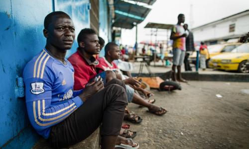 Unemployed taxi drivers during the Ebola crisis in Liberia in 2014.
