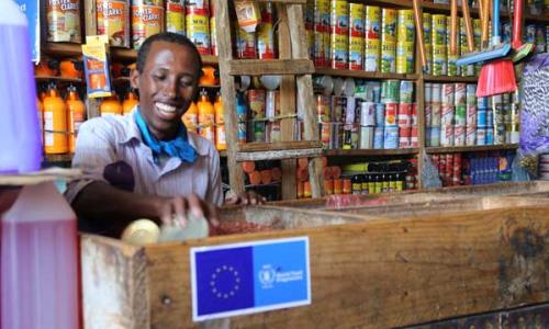 ​Retailers are embracing the system, because it brings them new customers who couldn’t afford to buy food from shops before. Photo:WFP/Laila Ali