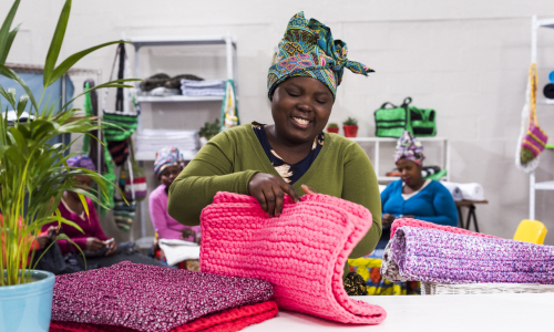 Happy owner processing order from a customer