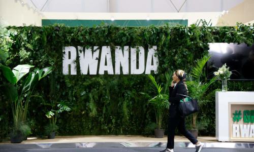 A participant walks past the Rwanda pavillon at the Sharm El Sheikh International Convention Centre