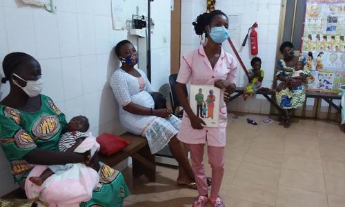 A midwife speaks about family planning at a family planning "open house" at a health centre in Assahoun, Togo.