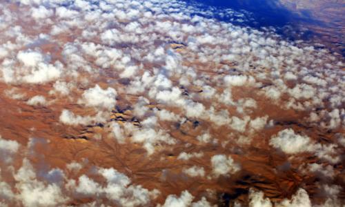 Clouds over the desert in southern Libya. Deserts form a large part of the country and human settlements are mostly found around oases. Photo Credits: Lason Athanasiadis/UNSMIL