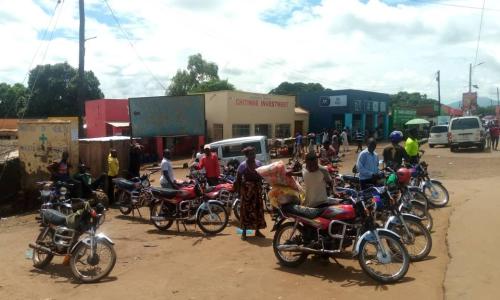 Motorcycle taxis at Lunzu town in Malawi. A good number of them are owned by women.