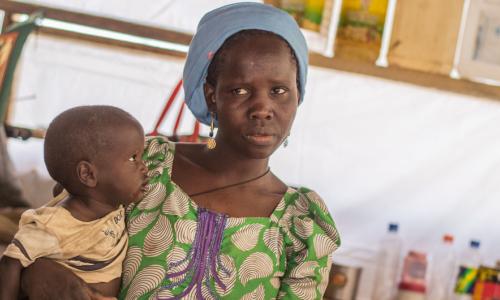 A mother and her baby at Internally Displaced People (IDP) Camp B in Mafa, Borno State, Nigeria.