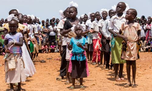 Children at a protection of civilians site in Juba, South Sudan, run by the UN Mission, perform at a special cultural event in March 2015. UN Photo/JC McIlwaine