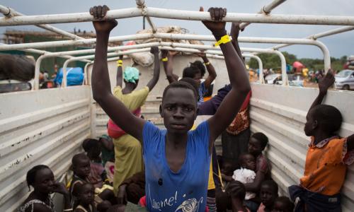 Refugees from South Sudan are transported from Elego town to the Numanzi Transit Center where meals and temporary accommodation are provided by UNHCR in Adjumani, northern Uganda. Photo: UNHCR/Will Swanson