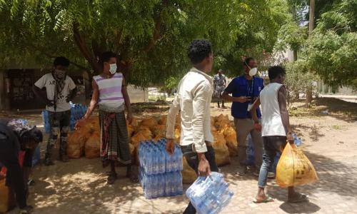 IOM Ethiopia Staff register returnees from Saudi Arabia at the Civil Service College quarantine centre in Addis Ababa.