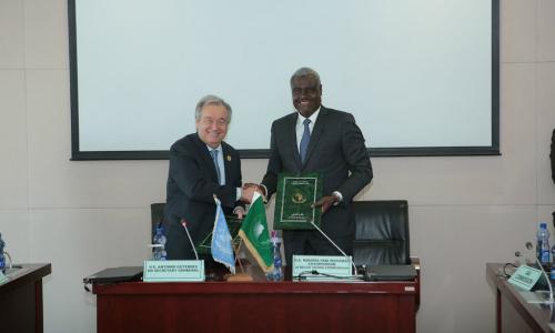 In Addis Ababa, Ethiopia, United Nations Secretary-General António Guterres and Moussa Faki, Chairperson of the African Union Commission, sign a Framework Agreement between the two organizations. UN Photo/Antonio Fiorente