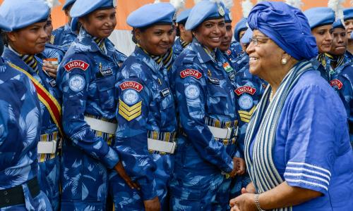 President Ellen Johnson-Sirleaf (left) with members of the all-female Indian Formed Police Unit serving with the UN Mission in Liberia. Photo: Emmanuel Tobey/UNMIL