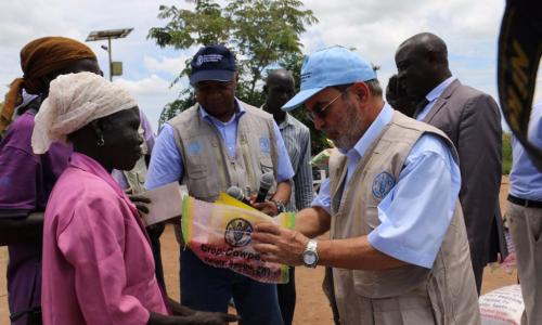 UN Food and Agriculture Organization (FAO) Director-General José Graziano da Silva in Uganda. Vegetable and crop seeds are provided to refugees to kick-start their food production. Photo: FAO/Anita Tibasaaga