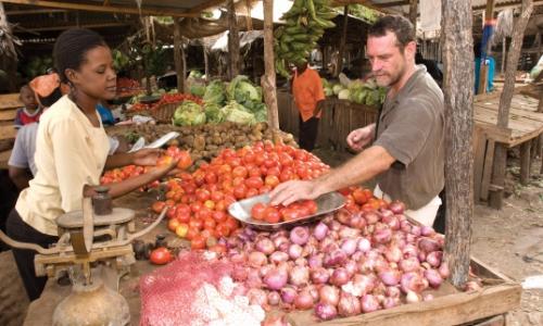 A woman selling agricultural produce in Kenya. Photo: Africa Media Online/Karin Duthie