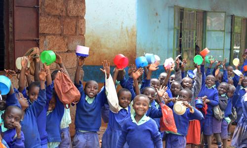 A global report has found that the most successful school feeding programs are community led and involve parents. Photo: Imperial College London Partnership for Child Development.
