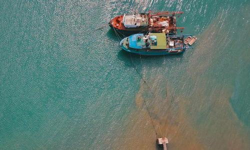 Boats docked near a port in Mombasa, Kenya.