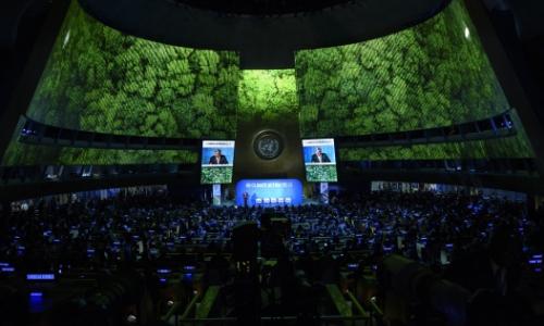 Secretary-General António Guterres (on screens and at podium) opens UN Climate Action Summit 2019
