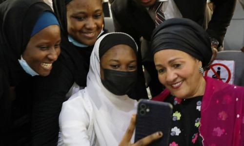 UN Deputy Secretary-General Amina Mohammed interacts with young women.