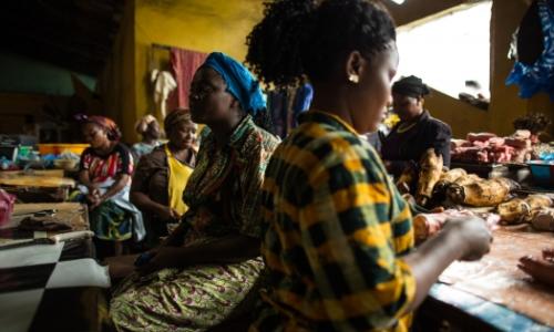 Vendors struggle with plummeting sales and rising cost of transporting goods to the market in West Point in Monrovia, Liberia, after the Ebola outbreak and quarantine took effect in the country.  Photo: UNDP/ Morgana Wingard