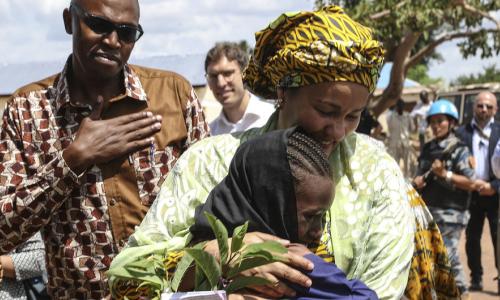 UN Deputy Secretary-General Amina Mohammed hugs a young girl during her visit to South Sudan.