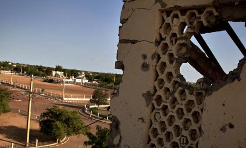 Walls of a building, which once housed a court, riddled with holes caused by heavy artillery in Gao, Mali.