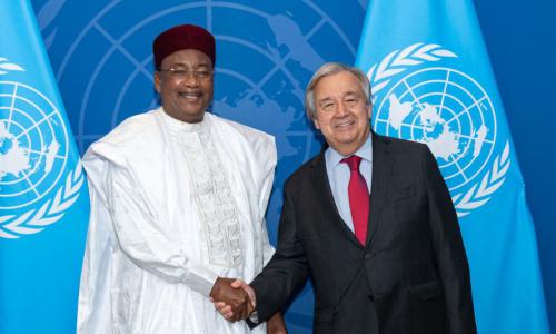 Secretary-General António Guterres (right) meets with Mahamadou Issoufou.