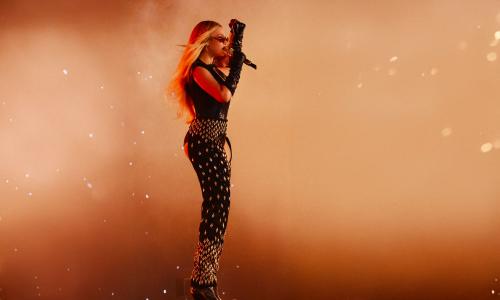 Beyoncé wears a custom Tongoro Couture Cowboy Chaps adorned with 444 golden cowries and 44 crystals for the opening night of the Cowboy Carter tour in Houston, Texas.