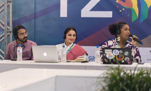 Lutfiyya Dean (center), head of the South African delegation at Youth 20, stands with representatives from South Africa and the African Union at the Youth 20 Summit, where they discussed a transformative agenda for the G20 under South Africa's presidency.