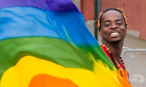 Displaying the rainbow flag of gay rights activists