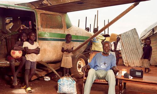 Roger Arnold Tabesse, 73, is one of the 30,000 people living in a camp for internally displaced people at M’Pok Airport. Credit: Stephen Gladieu/World Bank