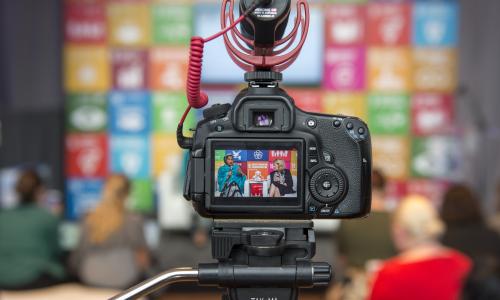 Deputy Secretary-General Amina Mohammed (left, on screen) in an interview at the SDG Media Zone.