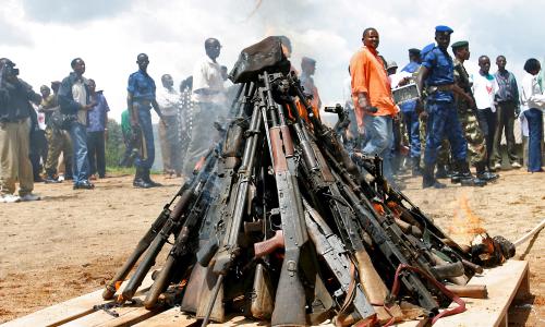 Weapons being burnt during the official launch of the Disarmament, Demobilization, Rehabilitation and Reintegration (DDRR) process in Muramvya, Burundi.             UN Photo/Martine Perret