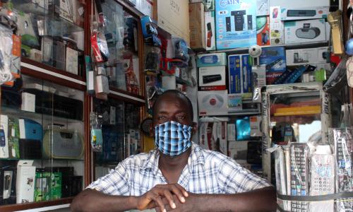 A trader in his electronics shop in the market in Treichville, Abidjan, during the COVID-19 crisis.