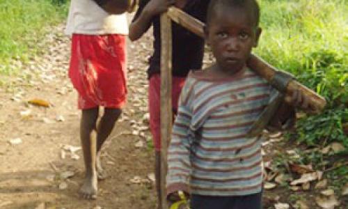 Some of Teddy Nakawoeisi’s grandchildren returning from work on a nearby farm