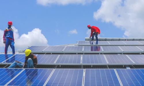 As part of a UNDP-led green renovation project, technicians install solar panels at a police academy in Rajaf, South Sudan. (21 August 2018)