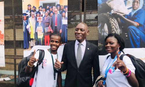 Mabingue Ngom (middle) with youths at a forum in Dakar, Senegal